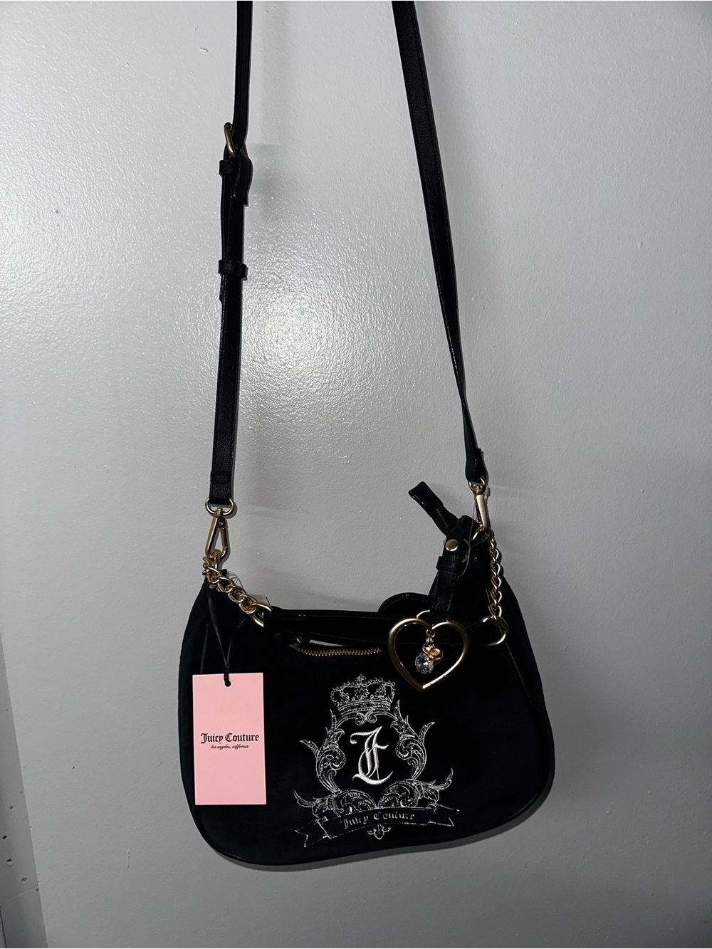 Juicy Couture Black Crossbody Bag with Heart Charm and Crest